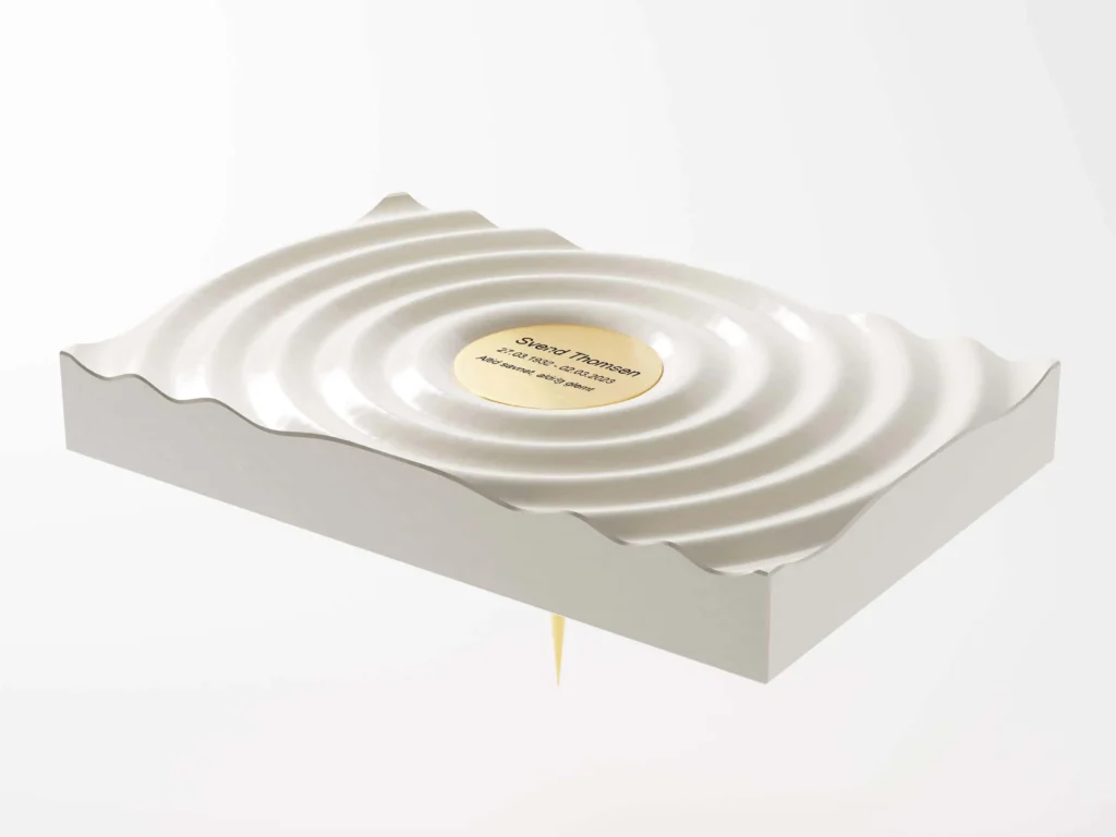 Timestone Impact gravminde i lys med navneplade